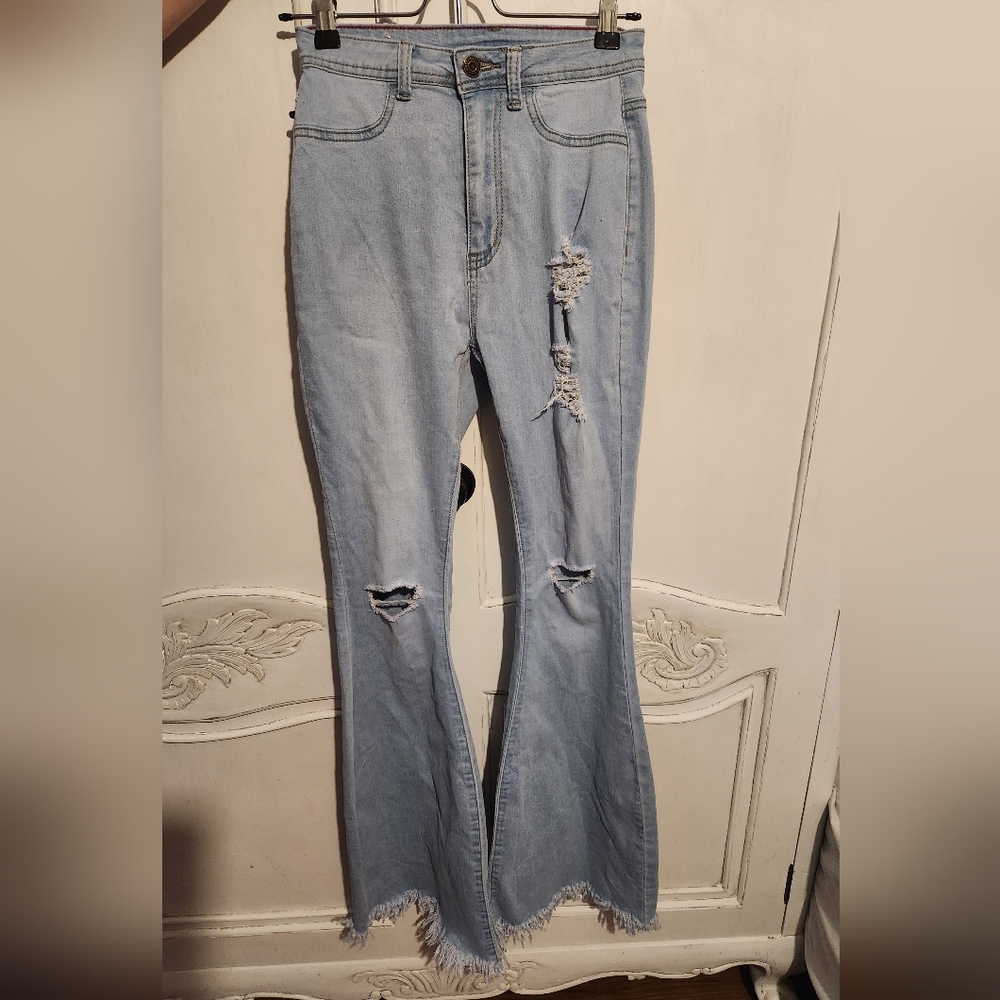 Flare Blue Denim Jeans with Distressed Style